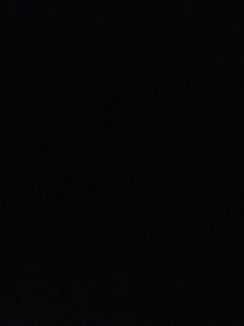 a dark room with a black background at Rum lora in Disah