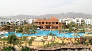 a view of a resort with two swimming pools at فندق دلتا شرم in Sharm El Sheikh