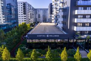 a view of a building in a city with tall buildings at Cortina North Luxury Studio in Voluntari