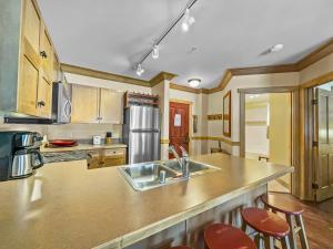 a kitchen with a sink and a counter top at CS129 Copper Springs in Copper Mountain