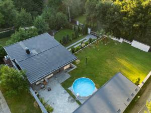 an overhead view of a backyard with a swimming pool at Villa Eterna in Tarčin