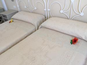 Posteľ alebo postele v izbe v ubytovaní Apartamento Danmi y Janet