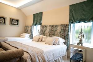 a bedroom with a bed and a window at Villa Turrion in Marbella +70 photos