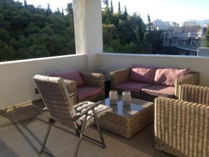 A seating area at Athens Lycabettus Hill Penthouse, Private Roof Garden & Pool