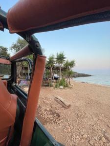 a view of a beach from the inside of a vehicle at Mateo Apartment in Himare