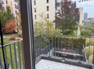a balcony with a view of a park at Ori's apartment in Frankfurt