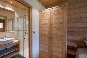 a bathroom with a shower and a sink at Aigle in Le Monêtier-les-Bains +30 photos