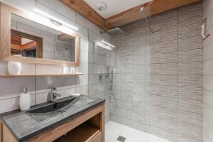 a bathroom with a sink and a shower at Izoard in Saint-Chaffrey +22 photos