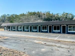 a blue building with a lot of windows at Meadow Room at The Trailblazer Unit 12 in Townsend