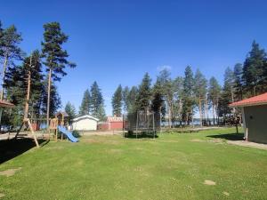 a park with a playground with a slide at Ulriksdal in Ulriksdal +2 photos