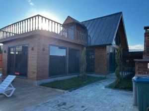 a house with a balcony and a deck at Bungavilla in Atakum