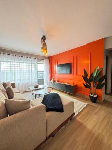 a living room with a couch and a table at Kasarani trm in Nairobi