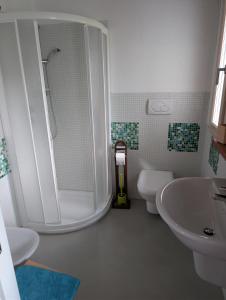 a bathroom with a shower and a toilet and a sink at Agriturismo Corte del Maso in Bassano del Grappa +60 photos