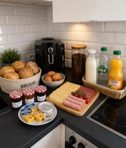 a kitchen counter with food on a counter top at Herzstück in Schwanebeck