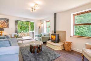 a living room with a couch and a fireplace at 3 Bed in Blackburn oc-96386 in Blackburn
