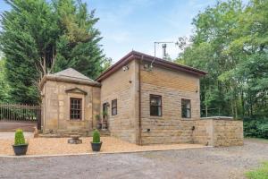 a small wooden building in a yard at 3 Bed in Blackburn oc-96386 in Blackburn