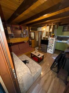 a living room with a couch and a table at Ovčar Banja in Čačak