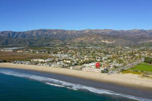 an aerial view of a beach with mountains in the background at Carpinteria Shores CS 103 in Carpinteria