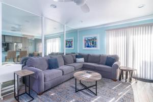a living room with a couch and a table at Carpinteria Shores CS 110 in Carpinteria