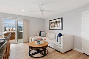 a living room with a couch and a table at Carpinteria Shores CS 107 in Carpinteria