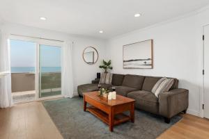 a living room with a couch and a table at Carpinteria Shores CS 209 in Carpinteria