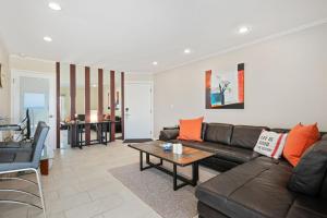 a living room with a couch and a table at Carpinteria Shores CS 212 in Carpinteria