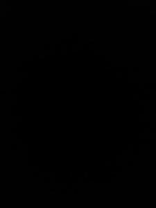 a dark room with a clock on the wall at وادي رم in Wadi Rum