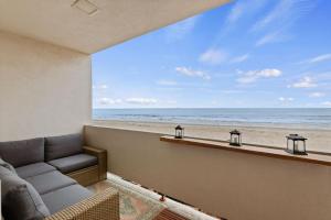 a living room with a view of the beach at Carpinteria Shores CS 206 in Carpinteria