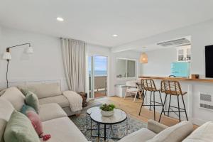 a living room with a couch and a table at Carpinteria Shores CS 206 in Carpinteria