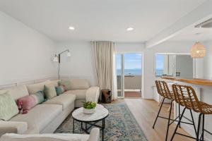 a living room with a couch and a table at Carpinteria Shores CS 206 in Carpinteria
