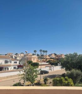 a view of a city with houses and a street at Super Cute Camposol 2 bed with Community Pool in Mazarrón