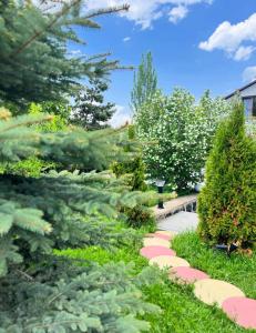 a garden with plants and a walkway at Rancho on Sevan beach by HV in Sevan +63 photos