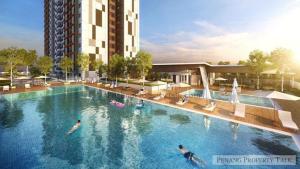 a swimming pool with two people in the water at 38 Romantic Studio Meritus Prai in Perai