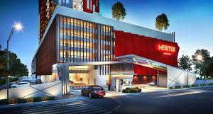 a car parked in front of a nautilus building at 38 Romantic Studio Meritus Prai in Perai