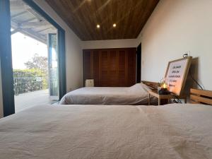 Llit o llits en una habitació de 一棟貸しVillaEDGE