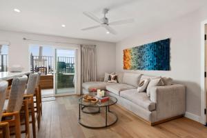 a living room with a couch and a table at Carpinteria Shores CS 105 in Carpinteria