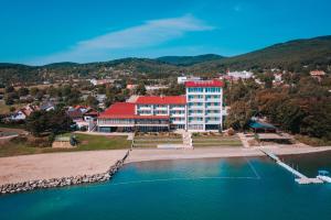 an aerial view of a hotel on the shore of the water at Houseboat Glamour & wellness in Kaluža