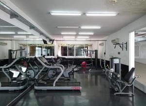 a gym with several treadmills and cardio machines at Departamento MOCA - Full Amenities in Buenos Aires