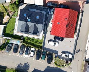 an overhead view of cars parked in a parking lot at Brzeg in Kuźnica