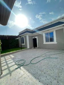 a house with a hose on a driveway at شالية خاص in Khamis Mushayt
