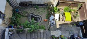 an overhead view of a yard with plants at Fewo am Wasserrad in Ruhla +13 photos