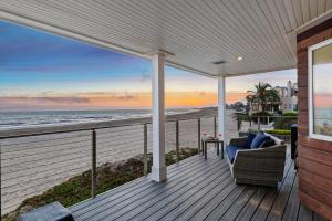 a deck with a view of the ocean at Sandcastle in Carpinteria