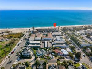 an aerial view of a parking lot with a red balloon at Sandcastle in Carpinteria +43 photos