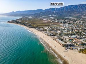 an aerial view of a beach and the ocean at Sandbox at Solimar Sands in Carpinteria