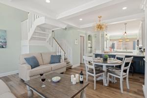 a living room with a couch and a table at Sandbox at Solimar Sands in Carpinteria