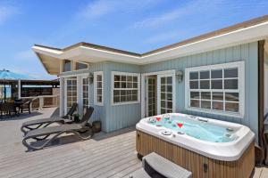 a hot tub on the deck of a house at Padaro Sands in Carpinteria +21 photos