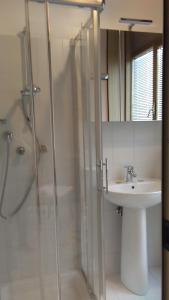 a bathroom with a shower and a sink at Bargoncello in Riccò del Golfo di Spezia