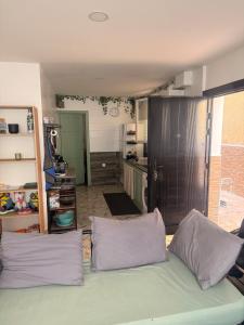 a living room with a couch and a kitchen at Mama house in El Marsa +42 photos