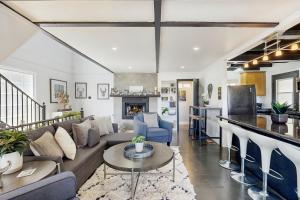 a living room with a couch and a table at The Polished Pine in Crestline