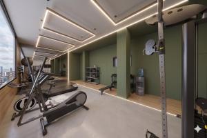 a gym with exercise equipment in a building at Hospedium GL Hotel Andújar in Andújar